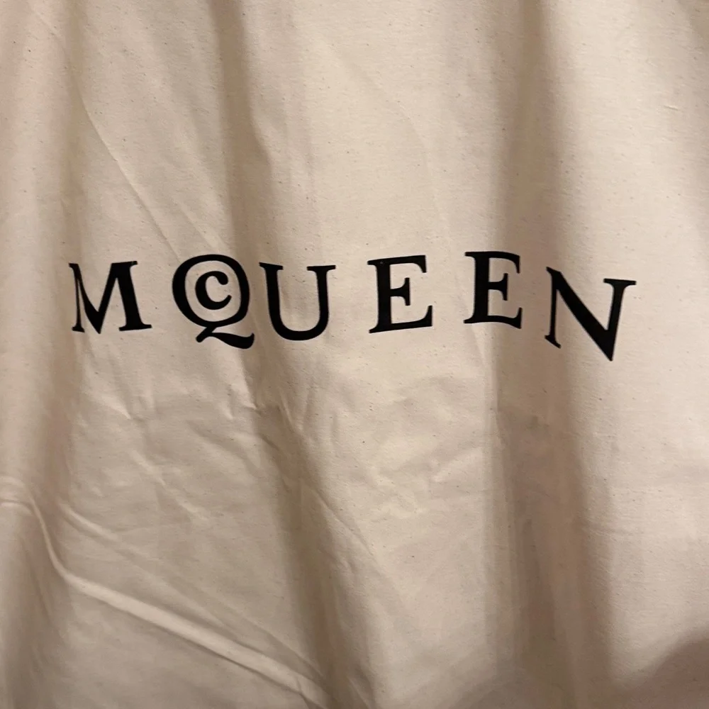 New McQueen Cream Garment Bag with hanger